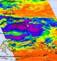 When NASA's Aqua satellite flew over Tropical Storm Banyan (Ramon) on Oct. 11, 2011, at 12:53 EDT, NASA AIRS infrared imagery showed Banyan's strong convection (purple) has strengthened and grown in area. Convection is slightly west of the center (marked with a white "X") which indicates wind shear from the east.