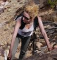 Jessica Whiteside, of Brown University, collecting specimens at Ghost Ranch, N.M. A low diversity of species leads to boom-bust cycles in the food supply.