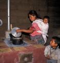 There was a one-third reduction in physician-diagnosed severe pneumonia among infants in Guatemalan households that had been randomly assigned to use cookstoves with chimney attachments, such as the one pictured here.