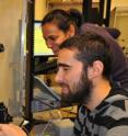 Graduate student Zev Wisotsky (seated) is the first author of the research paper and works in the lab of Anupama Dahanukar, seen here behind him.