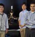 This is Kuniharu Takei, Toshitake Takahashi and Ali Javey at the microscope electric probe station used to characterize flexible and stretchable backplanes for e-skin and other electronic devices.