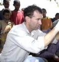 Bruce Gaynor, MD, performs an ocular examination on a patient in Ethiopia, where there is a high prevalence of trachoma, the world’s leading cause of preventable blindness.