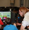 The University of Utah has teamed with Google to teach kids with autism how to use Google's 3-D modeling software called SketchUp. A new study from the university shows that in developing the workshops designed to teach needed job skills, Utah researchers found extra benefits, such as stronger interpersonal relationships and greater confidence due, in large part, to a focus on the kids' talents instead of their disorder. Here, certified SketchUp instructor Steve Gross teaches two children how to use the software.