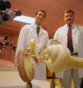Cochlear implants may be a safe, effective option for some organ transplant patients who've lost their hearing as an unfortunate consequence of their transplant-related drug regime, report Dr. Brian J. McKinnon, otologist and neurotologist (right), and Dr. Kenneth C. Iverson, Chief Resident in otolaryngology, at the Medical College of Georgia at Georgia Health Sciences University.