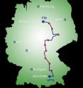 This is a map of Germany showing the path of the 920-kilometer-long optical fiber link from Max Planck Institute of Quantum Optics to the Federal Institute of Physical and Technical Affairs. The red houses represent amplifier stations. This is a map of Germany showing the path of the 920-kilometer-long optical fiber link from Max Planck Institute of Quantum Optics to the Federal Institute of Physical and Technical Affairs. The red houses represent amplifier stations.