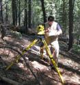 University of Montana's Andrew Larson surveys a portion of a plot in Yosemite National Park where scientists and volunteers tallied above-ground biomass including live trees, snags and downed woody debris. University of Montana's Andrew Larson surveys a portion of a plot in Yosemite National Park where scientists and volunteers tallied above-ground biomass including live trees, snags and downed woody debris.