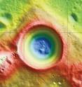 This is an elevation map of Shackleton crater made using LRO Lunar Orbiter Laser Altimeter data. The false colors indicate height, with blue lowest and red/white highest.
