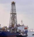 This shows the drillship <i>JOIDES Resolution</i> during one of its port calls in Honolulu Harbor.