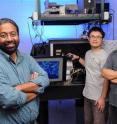 Iowa State University and Ames Laboratory researchers, left to right, Sanjeevi Sivasankar, Chi-Fu Yen and Hui Li have invented microscope technology to study single biological molecules.