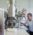 Professor Morgan Alexander studies samples with the Time of Flight Ion Mass Spectrometry. Professor Morgan Alexander studies samples with the Time of Flight Ion Mass Spectrometry.