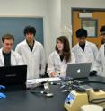 Student researchers document their findings as they prepare for a global, synthetic biology competition. This is (L-R) Amanda Ispas, Joe Barth, Ryan Muller, Madeline Sands, Nisarg Patel, and Abhinav Markus.