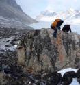 University at Buffalo Associate Professor Jason Briner (right) and students Sean McGrane and Elizabeth Thomas (in orange) studied boulders on Baffin Island to learn about glaciers' past activity there.