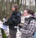Lysanne Snijders (left), a doctoral student in the Netherlands, uses electronic tags, base stations and computer interface to study the social behavior of small woodland birds.