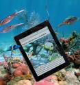 This is a photo illustration of a Kindle in a marine environment.