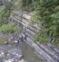 This photo shows researchers studying exposures of the Doushanto Formation. Located in China, the formation is most notable for its scientific contributions in the hunt for Precambrian life.