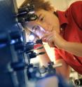 This shows EPFL Professor Sylvie Roke setting up a non-linear optical experiment.