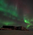 This shows an aurora appearing in the night sky at the Kjell Henriksen Observatory in Svalbard, Norway. Taken November 2010.