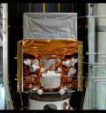 This photograph, taken in May 2008 as the Fermi Gamma-ray Space Telescope was being readied for launch, highlights the detectors of the spacecraft's Gamma-ray Burst Monitor (GBM). The GBM is an array of 14 crystal detectors designed for transient lower-energy gamma-ray outbursts, such as TGFs.


<p><b>Larger image:</b> <a target="_blank"href="http://www.nasa.gov/images/content/712091main_Fermi_in_fairing_labeled.jpg">http://www.nasa.gov/images/content/712091main_Fermi_in_fairing_labeled.jpg</a>.