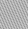 This electron microscope image shows the gold mesh created by Chou and colleagues. Each hole is 175 nanometers in diameter, which is smaller than the wavelength of light.