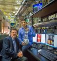 Robert Ritchie (left), Lawrence Berkeley National Laboratory, and Hrishikesh Bale, Lawrence Berkeley National Laboratory, are pictured at ALS Beamline 8.3.2 with the mechanical testing rig they developed for in situ ultrahigh temperature X-ray computed microtomography.