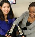 Ayanna Howard (right), Georgia Tech professor of electrical and computer engineering, and graduate student Hae Won Park (left) have created Access4Kids, a wireless input device that uses a sensor system to translate physical movements into fine-motor gestures to control a tablet.