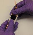 This University of Delaware research image shows a fully stretchable supercapacitor composed of carbon nanotube macrofilms, a polyurethane membrane separator and organic electrolytes.