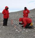 Professor Byron Adams, Brigham Young University, and colleagues carry out experiments on soil in Antarctica.
