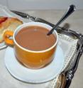 Hot chocolate tastes better in an orange colored cup.