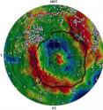 This is an overview map of Vesta’s southern hemisphere. The circles, diamonds, and stars show where the dark material occurs. The red line depicts the rim of the Veneneia basin, the black line the rim of the younger Rheasilvia basin.