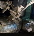 On July 12, 2011, spacewalking astronauts Mike Fossum and Ron Garan successfully transferred the Robotic Refueling Mission, or RRM, module from the Atlantis shuttle cargo bay to a temporary platform on the International Space Station's Dextre robot.
