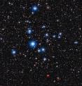 This image from the Wide Field Imager on the MPG/ESO 2.2-metre telescope at ESO's La Silla Observatory in Chile, shows the bright open star cluster NGC 2547. Between the bright stars, far away in the background of the image, many remote galaxies can be seen, some with clearly spiral shapes. This image from the Wide Field Imager on the MPG/ESO 2.2-metre telescope at ESO's La Silla Observatory in Chile, shows the bright open star cluster NGC 2547. Between the bright stars, far away in the background of the image, many remote galaxies can be seen, some with clearly spiral shapes.