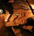 This shows scientists working at the El Sidrón cave (Spain).