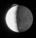 This five-frame sequence of images from NASA's New Horizons mission captures the giant plume from Io's Tvashtar volcano. Snapped by the probe's Long Range Reconnaissance Imager (LORRI) as the spacecraft flew past Jupiter in 2007, this first-ever movie of an Io plume clearly shows motion in the cloud of volcanic debris, which extends 330 km (205 miles) above the moon's surface. Only the upper part of the plume is visible from this vantage point. The plume's source is 130 km (80 miles) below the edge of Io's disk, on the far side of the moon. Io's hyperactive nature is emphasized by the fact that two other volcanic plumes are also visible off the edge of Io's disk: Masubi at the 7 o'clock position, and a very faint plume, possibly from the volcano Zal, at the 10 o'clock position. Jupiter illuminates the night side of Io, and the most prominent feature visible on the disk is the dark horseshoe shape of the volcano Loki, likely an enormous lava lake. Boosaule Mons, which at 18 km (11 miles) is the highest mountain on Io and one of the highest mountains in the solar system, pokes above the edge of the disk on the right side. The five images were obtained over an 8-minute span, with two minutes between frames, from 23:50 to 23:58 Universal Time on 1 March 2007. Io was 3.8 million km (2.4 million miles) from New Horizons.