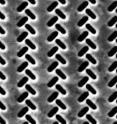 An electron micrograph shows the nanoscale perforations at the surface of the plasmonic coupler.