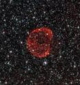These delicate wisps of gas make up an object known as SNR B0519-69.0, or SNR 0519 for short. The thin, blood-red shells are actually the remnants from when an unstable progenitor star exploded violently as a supernova around 600 years ago. There are several types of supernovae, but for SNR 0519 the star that exploded is known to have been a white dwarf star -- a sun-like star in the final stages of its life.