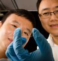 This shows NTU Asst Prof Wang Qijie, 34, and lead author PhD student Liu Tao, 29, looking at their newly designed nanostructured graphene