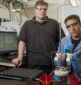 University of Delaware Prof. Joel Rosenthal (left) and doctoral student John DiMeglio have developed an inexpensive catalyst that uses the electricity generated from solar energy to convert carbon dioxide, a major greenhouse gas, into synthetic fuels for powering cars, homes and businesses.
