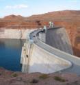 This is Lake Powell and Glen Canyon Dam in July 2004, when the high-water mark was about 120 feet above the water's surface. This year, Lake Powell and Lake Mead are heading toward their lowest levels since 1968.