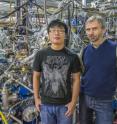 Eryin Wang (left) and Alexei Fedorov are at ALS Beamline 12.0.1 where the induced high temperature superconductivity in a topological insulator was confirmed. Eryin Wang (left) and Alexei Fedorov are at ALS Beamline 12.0.1 where the induced high temperature superconductivity in a topological insulator was confirmed.