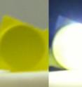 This is a photograph of bright white light (right) achieved using lasers in combination with phosphors next to an image of the phosphor with no illumination.