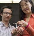 Washington State University graduate student Yu "Will" Wang (l) and Professor Katie Zhong have worked on an electrolyte that is twice as sticky as chewing gum.
