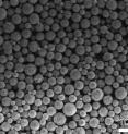 By precisely controlling the process used to make them, Stanford and SLAC researchers can produce pomegranate clusters of a specific size for silicon battery anodes. 
<P>Left: Microscopic clusters form a fine black powder that can be coated on foil to create an anode. Middle: A single cluster. 
<P>Right: In this close-up of a cluster, a silicon nanoparticle can be seen inside its yolk shell, with space to swell during battery charging.