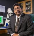 Ravi Bellamkonda, lead investigator for the GBM project and chair of the Wallace H. Coulter Department of Biomedical Engineering at Georgia Tech and Emory University, is shown with equipment used to study the cancer.