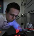 Michał Maciejczyk, a doctoral student at the IPC PAS, demonstrates record efficient luminescence of europium complexes with phosphine oxide co-ligands -- new chemicals developed at the Institute of Physical Chemistry of the Polish Academy of Sciences in Warsaw. Michał Maciejczyk, a doctoral student at the IPC PAS, demonstrates record efficient luminescence of europium complexes with phosphine oxide co-ligands -- new chemicals developed at the Institute of Physical Chemistry of the Polish Academy of Sciences in Warsaw.