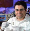 Iowa State's Reza Montazami examines a degradable antenna capable of data transmission.