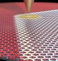 Using a sharp metal scanning tunneling microscopy tip, LeRoy and his collaborators were able to move the domain border between the two graphene configurations around.