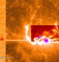 This combined image shows the March 29, 2014, X-class flare as seen through the eyes of different observatories. SDO is on the bottom/left, which helps show the position of the flare on the sun. The darker orange square is IRIS data. The red rectangular inset is from Sacramento Peak. The violet spots show the flare's footpoints from RHESSI.