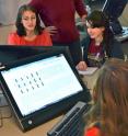 Arizona State University undergraduate students study biology with associate professor Valerie Stout.