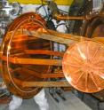 This image shows the insertion of the EXO-200 detector into the cryostat 650 meters below ground at the Waste Isolation Pilot Plant (WIPP) near Carlsbad (New Mexico).