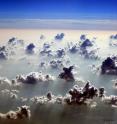 This shows convective clouds forming over the Amazon in a blanket smoke.